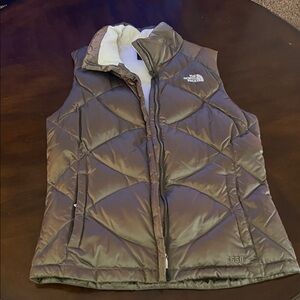 The North Face Women's Quilted Vest in Olive Green.